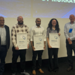 Top young Auckland engineers recognised From left: Naresh Singhal (ENZ Auckland committee member), Dylan Maurice, UNITEC (winner), Avinash Mistry, MIT (third place), Michelle Delves, University of Auckland (runner-up), David Brierley (ENZ Auckland chair).