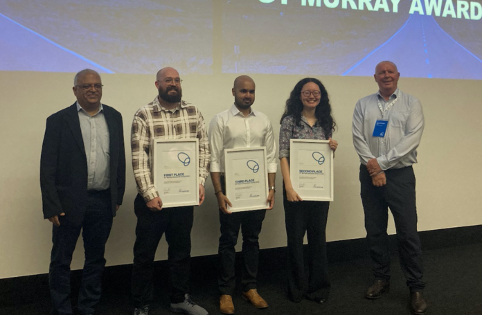 From left: Naresh Singhal (ENZ Auckland committee member), Dylan Maurice, UNITEC (winner), Avinash Mistry, MIT (third place), Michelle Delves, University of Auckland (runner-up), David Brierley (ENZ Auckland chair).
